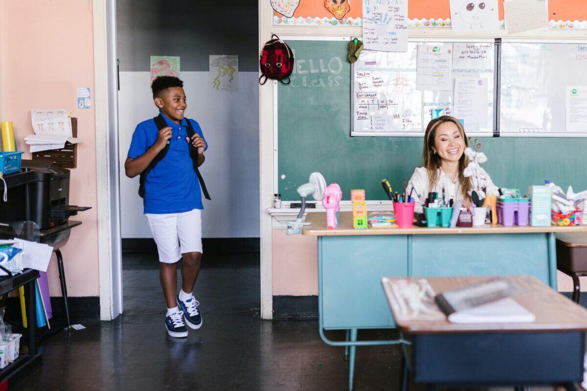Student walking into classroom